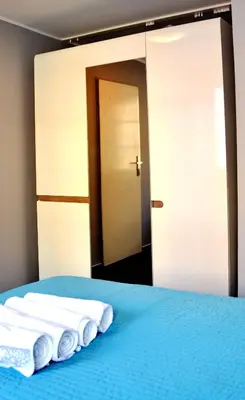 Łóżko lub łóżka w pokoju w obiekcie Apartament Rynek