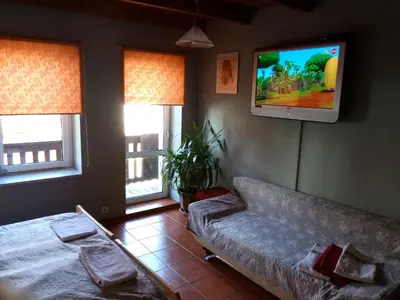 Łóżko lub łóżka w pokoju w obiekcie Villa- Jaś