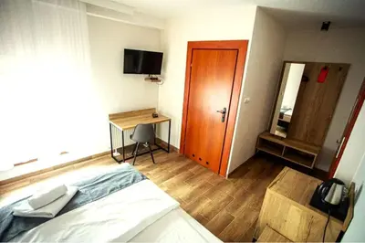 Telewizja i/lub zestaw kina domowego w obiekcie Apartamenty Pod Lwem
