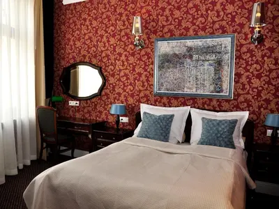 Łóżko lub łóżka w pokoju w obiekcie SleepWalker Boutique Suites