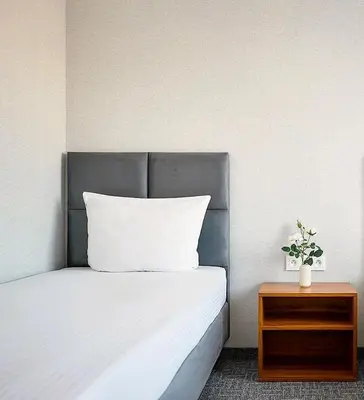 Łóżko lub łóżka w pokoju w obiekcie Hotelik B&B Pod Dębami