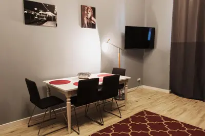 Telewizja i/lub zestaw kina domowego w obiekcie Art Deco/Vintage Apartments