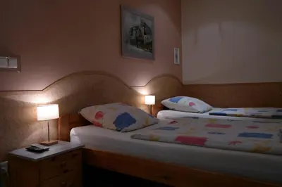 Łóżko lub łóżka w pokoju w obiekcie VillaMirage