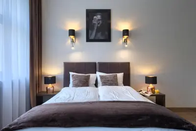 Łóżko lub łóżka w pokoju w obiekcie Abba Apartments