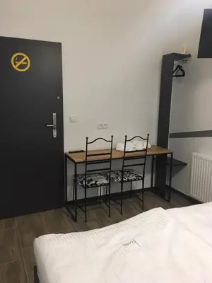 Łóżko lub łóżka w pokoju w obiekcie Kimanoclegi