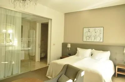 Łóżko lub łóżka w pokoju w obiekcie Hotel Jakubus