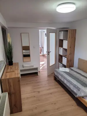 Łóżko lub łóżka w pokoju w obiekcie 44 Śląska