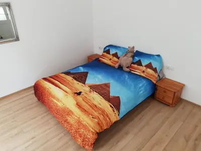 Łóżko lub łóżka w pokoju w obiekcie Słowiańska 4