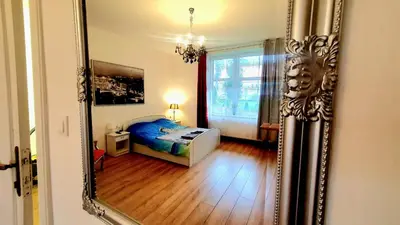 Łóżko lub łóżka w pokoju w obiekcie Słowiańska 4