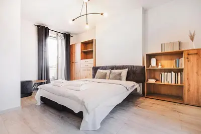 Łóżko lub łóżka w pokoju w obiekcie Komfortowe apartamenty w centrum Wrocławia