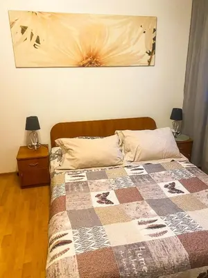 Łóżko lub łóżka w pokoju w obiekcie Pokoje Gościnne Emilio