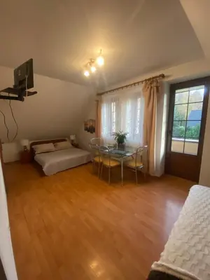 Łóżko lub łóżka w pokoju w obiekcie Pokoje Gościnne Emilio