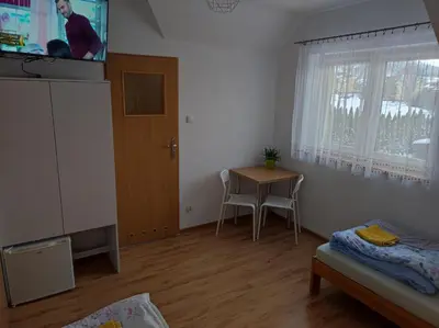 Łóżko lub łóżka w pokoju w obiekcie Górski Kryształ