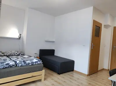 Łóżko lub łóżka w pokoju w obiekcie Górski Kryształ