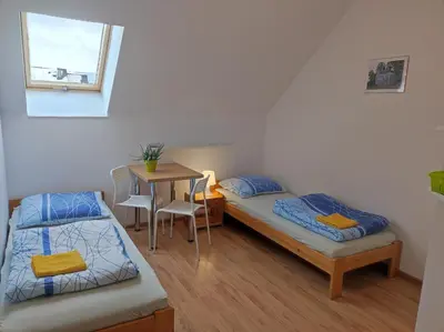 Łóżko lub łóżka w pokoju w obiekcie Górski Kryształ