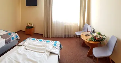 Łóżko lub łóżka w pokoju w obiekcie Confero