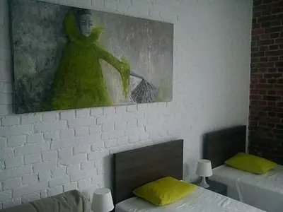 Łóżko lub łóżka w pokoju w obiekcie MoHo S