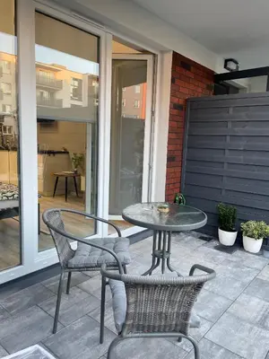Patio lub wspólna przestrzeń na świeżym powietrzu w obiekcie Apartament Poezji A39 Grey