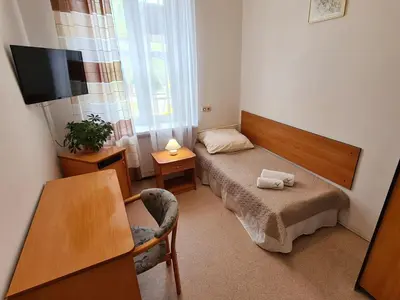 Łóżko lub łóżka w pokoju w obiekcie CKS Wrocław - Centrum Konferencyjno-Szkoleniowe CS Natura Tour
