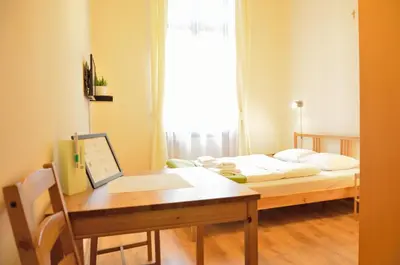 Łóżko lub łóżka w pokoju w obiekcie WenderEDU Business Center