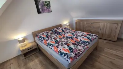 Łóżko lub łóżka w pokoju w obiekcie Blu Raj - domy w Sudetach