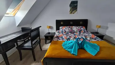 Łóżko lub łóżka w pokoju w obiekcie Blu Raj - domy w Sudetach