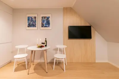 Telewizja i/lub zestaw kina domowego w obiekcie Q17 Apartments Rynek