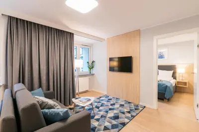 Telewizja i/lub zestaw kina domowego w obiekcie Q17 Apartments Rynek