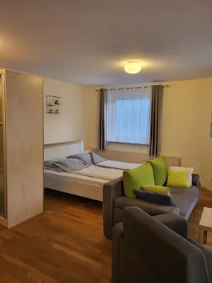 Łóżko lub łóżka w pokoju w obiekcie Apartamenty Bystrzycka - Bliżej Zdroju