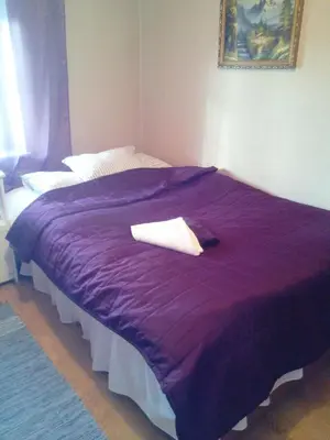 Łóżko lub łóżka w pokoju w obiekcie Gościniec ELLA INN Lipniki
