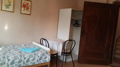Łóżko lub łóżka w pokoju w obiekcie Gościniec ELLA INN Lipniki