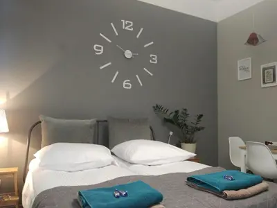 Łóżko lub łóżka w pokoju w obiekcie Apartament Easy Stay Center