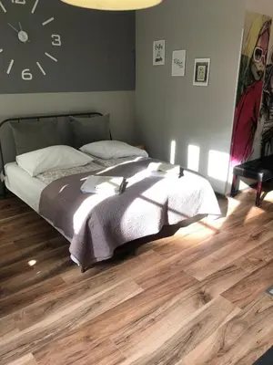 Łóżko lub łóżka w pokoju w obiekcie Apartament Easy Stay Center