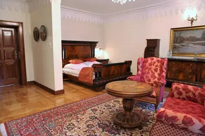 Łóżko lub łóżka w pokoju w obiekcie Pałac Sulisław