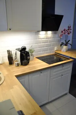 Kuchnia lub aneks kuchenny w obiekcie Apartament na Tęczowej