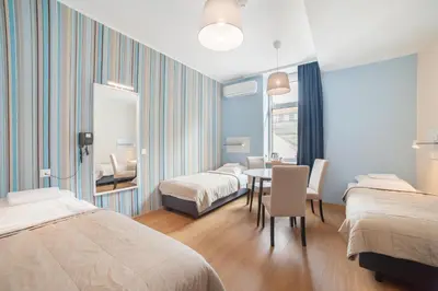 Łóżko lub łóżka w pokoju w obiekcie Hotel Traffic Wrocław Stare Miasto