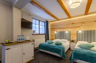 Łóżko lub łóżka w pokoju w obiekcie Vital&Spa Resort Szarotka