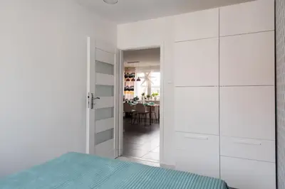 Łóżko lub łóżka w pokoju w obiekcie Legnica Apartament 52m2 Delux 1