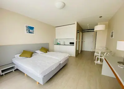 Łóżko lub łóżka w pokoju w obiekcie Apartamenty Czarna Góra Veraneo