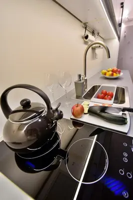 Kuchnia lub aneks kuchenny w obiekcie Apartamenty Sjesta Centrum w centrum miasta z prywatnym parkingiem