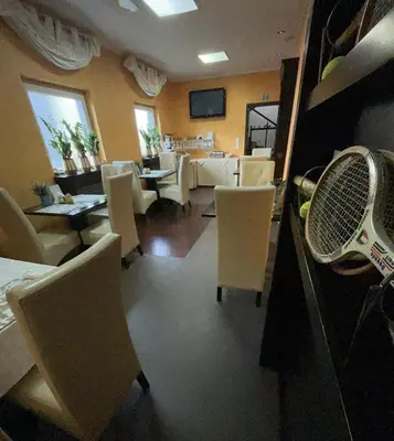 Telewizja i/lub zestaw kina domowego w obiekcie Tenis Club