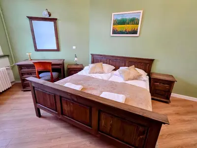 Łóżko lub łóżka w pokoju w obiekcie Zamek Otmuchów