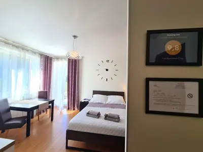 Łóżko lub łóżka w pokoju w obiekcie Lux Apartment Cosy