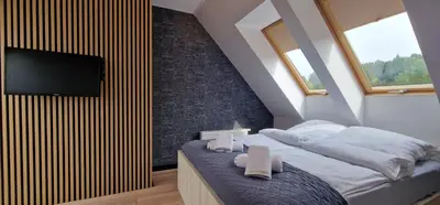 Łóżko lub łóżka w pokoju w obiekcie Lux Apartment Duplex