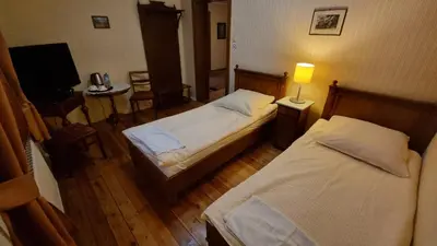 Łóżko lub łóżka w pokoju w obiekcie Villa Kliche