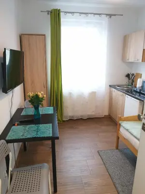 Kuchnia lub aneks kuchenny w obiekcie POKOJE - STUDIO GLIWICE I przy ONKOLOGII