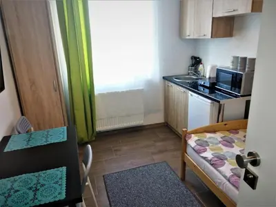 Kuchnia lub aneks kuchenny w obiekcie POKOJE - STUDIO GLIWICE I przy ONKOLOGII
