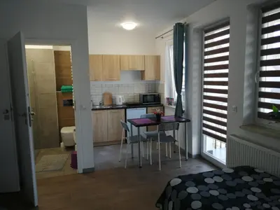 Kuchnia lub aneks kuchenny w obiekcie POKOJE - STUDIO GLIWICE I przy ONKOLOGII