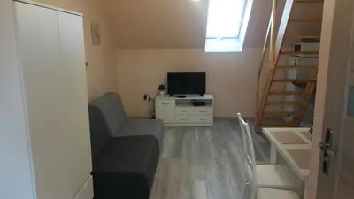 Telewizja i/lub zestaw kina domowego w obiekcie Nad Strumykiem 2