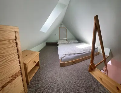 Łóżko lub łóżka w pokoju w obiekcie Nad Strumykiem 2